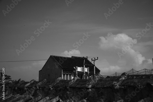 Monochrome Photography. Black and white photo of a house from behind a tiled roof. Bandung - Indonesia, Asia