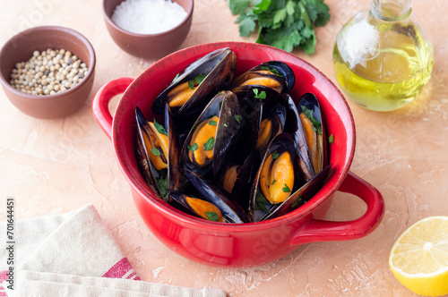 Cooked mussels with oil and parsley. Sea food. Healthy eating. Diet.