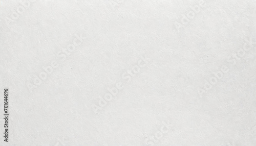 A refined, white paper texture with subtle patterns, ideal for backgrounds or elegant designs.