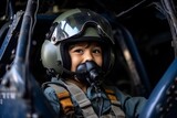 Little boy pilot with helmet and goggles in a cockpit of an airplane