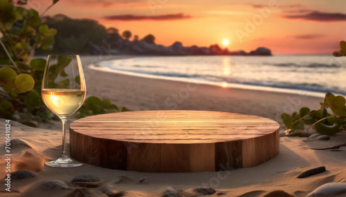 Vacant circular wooden platform featuring a glass of wine, set against the backdrop of a beach during the sunset