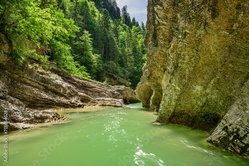 Austria, Tyrol,BrandenbergerAche river flowing throughTiefenbach Gorg in summer photo