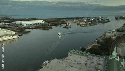 Aerial view of push boat sputtering along in Mobile River Mobile Alabama photo