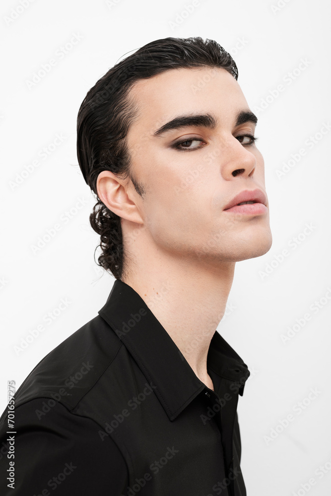 Fashionable man in black shirt against white background Fashionable man in black shirt against white background
