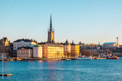 Sweden, Stockholm, Riddarholmen island with tower of Riddarholmen Church in background photo