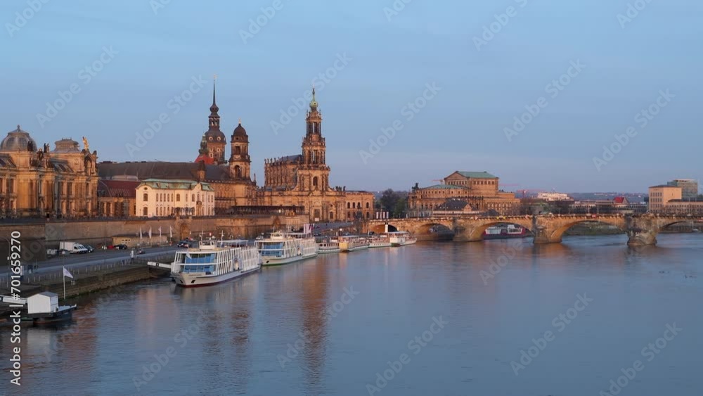 Sunrise on Dresden's skyline and Elbe river, Semperoper, and Cathedral Sunrise on Dresden's skyline and Elbe river, Semperoper, and Cathedral