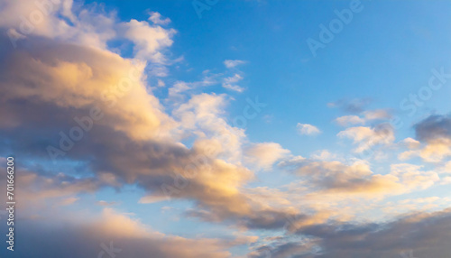 Blue sky background with clouds at sunset