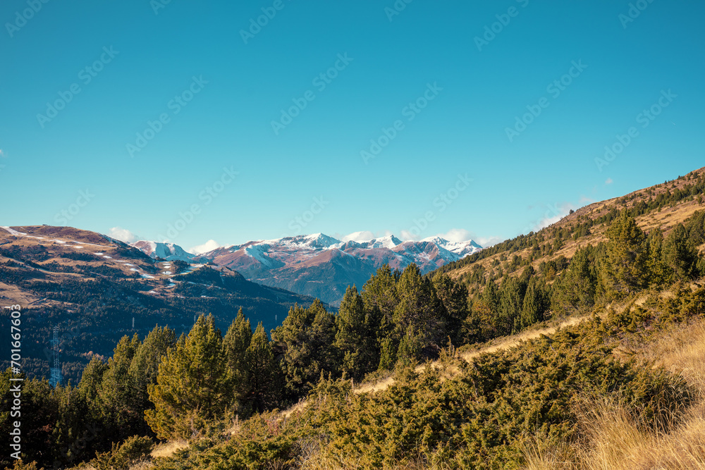 Fototapeta premium Mountains landscape in autumn. View of mountain slopes on a sunny day, Pyrenees, Andorra, Europe