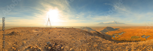 180 degree top hill panoramic view of sunrise with closeup of Ararat mountains with the Khor Virap monastery at fall. Travel destination Armenia