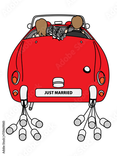 赤いオープンカーでハネムーンに出かける新婚カップル