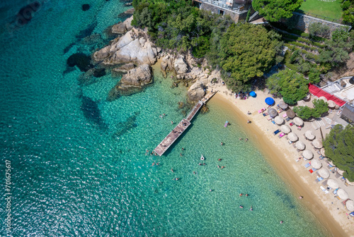 Fototapeta Naklejka Na Ścianę i Meble -  Aerial top view of the turquoise sea at Vromolimnos beach at Skiathos island, Sporades, Greece