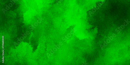 Elegant green background with marbled texture; old vintage grunge design; green Christmas background;Paint stains with spots, blots, grains, splashes. Colorful wallpaper. 