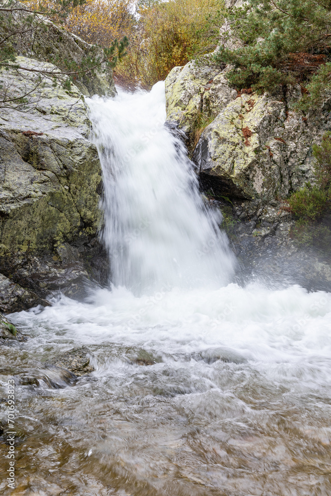 waterfall in a river in the Sierra de Guadarrama in Madrid called Poza de Socrates waterfall in a river in the Sierra de Guadarrama in Madrid called Poza de Socrates