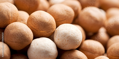 Nuts closeup view banner  Group of nuts on brown background  Raw dried chickpea seeds close up  Walnut kernels in a shell on rustic wooden table. healthy eating  close up  generative AI    