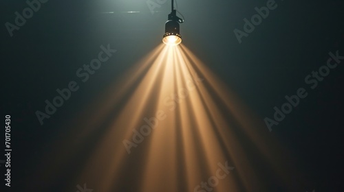 A picture of a light pole illuminating the darkness. Suitable for illustrating the concept of light in darkness photo