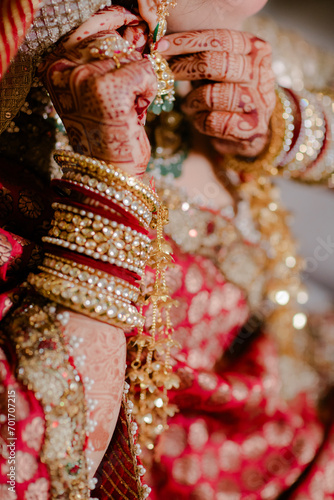 Indian bridal showing wedding mehndi design and Kalire bangles