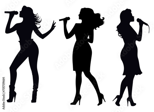Silhouettes Of Female Singers Performing On Stage