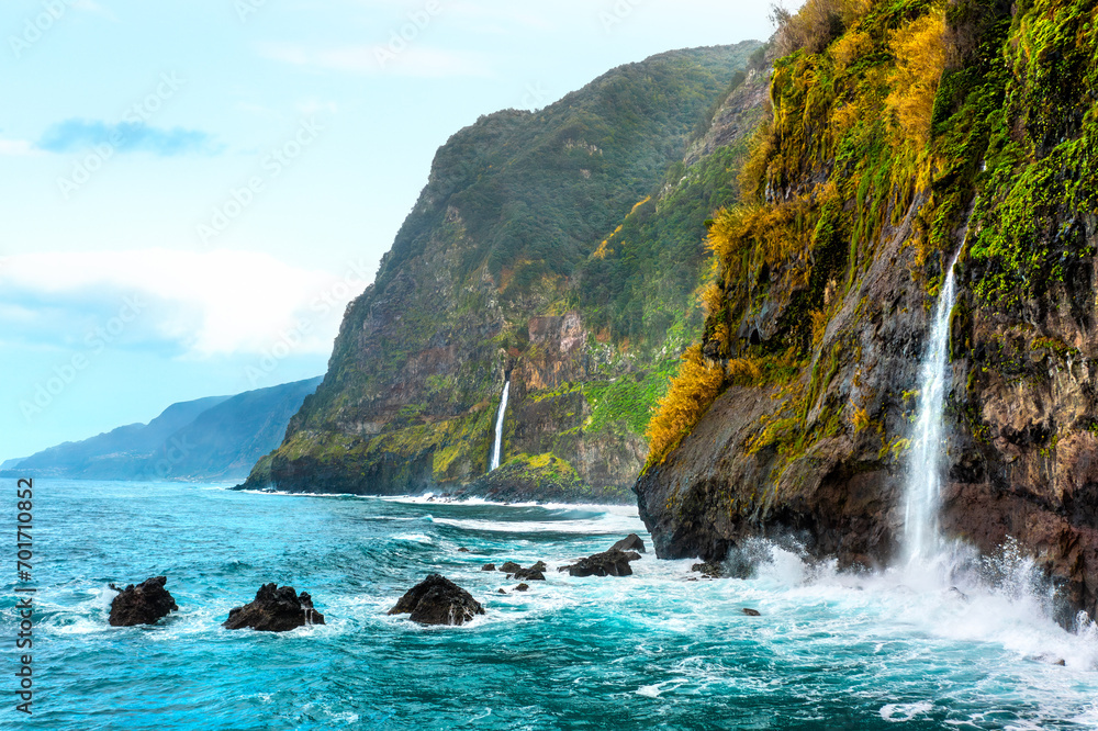 Beautiful view of Cascata do Veu da Noiva waterfall or Bridal Veil near Porto Moniz and Seixal. Madeira Island, Portugal