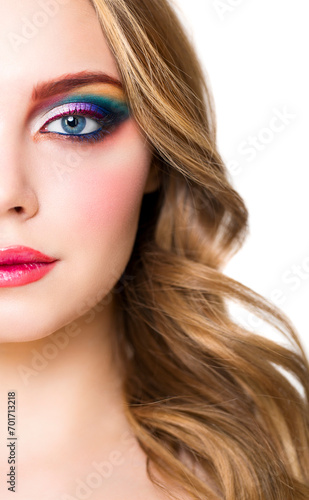 Portrait of a beautiful young blond model with bright make up