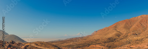Wide angle panoramic view of sunrise over the Ararat mountains. Travel destination Armenia