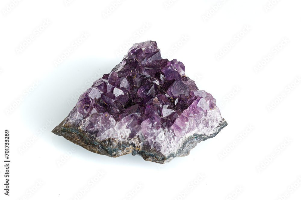 Amethyst mineral stone macro on white background Amethyst mineral stone macro on white background