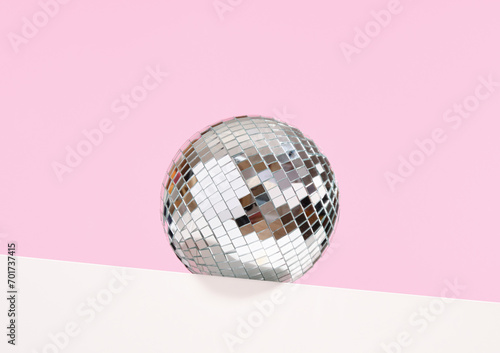 Mirror shining disco ball. Party and dancing in the club. Recreation and alcohol.