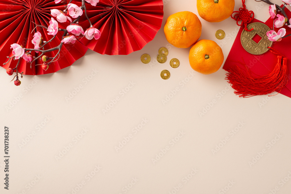 Obraz premium CNY traditional decorations. Top view of hanging knot, vibrant red fans, money envelopes, fortune coins, tangerines, flowers on festive, auspicious background with space for greetings or event details