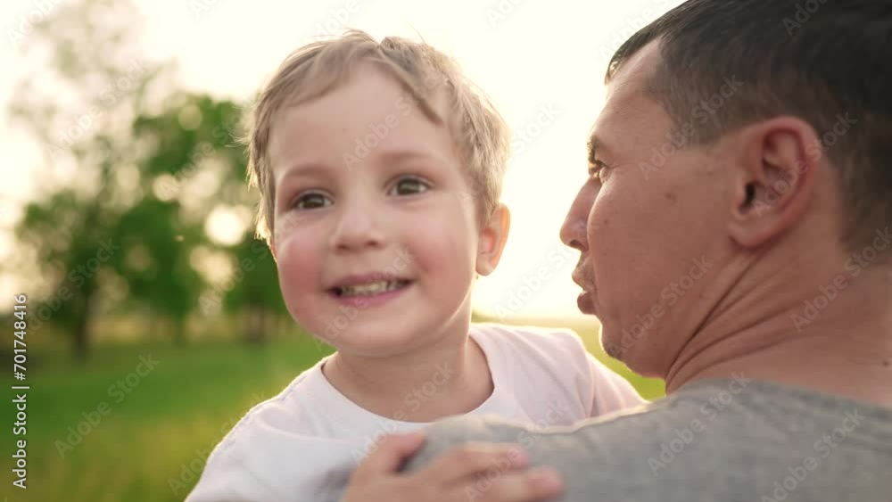son hugging dad in the park. happy family a father day kid dream concept. baby baby boy walking lifestyle with dad in nature in his arms. baby hugging dad in the park son hugging dad in the park. happy family a father day kid dream concept. baby baby boy walking lifestyle with dad in nature in his arms. baby hugging dad in the park