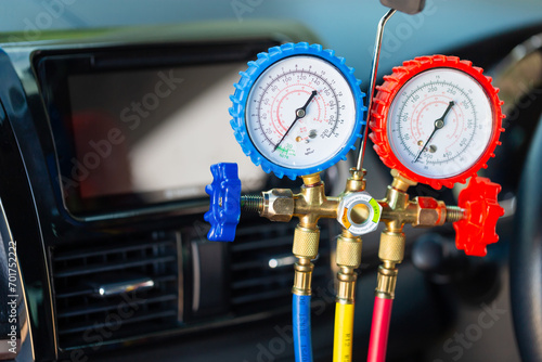 Car Air Conditioning Repair Concepts, monitor tool to check and fix car air conditioner system photo