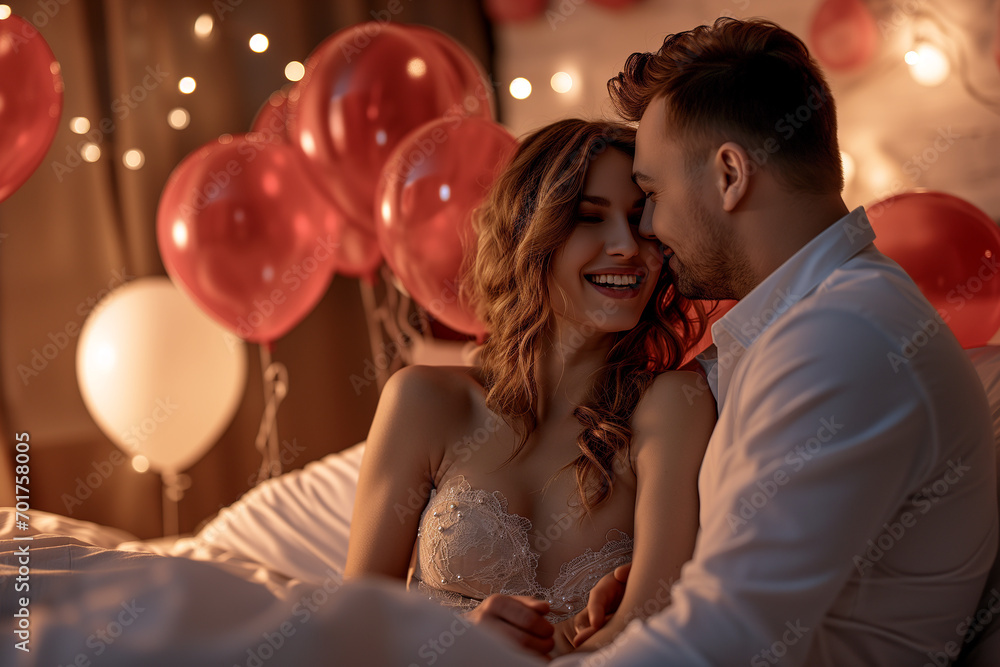 couple with red balloons at home in bedroom. couple with red balloons at home in bedroom.