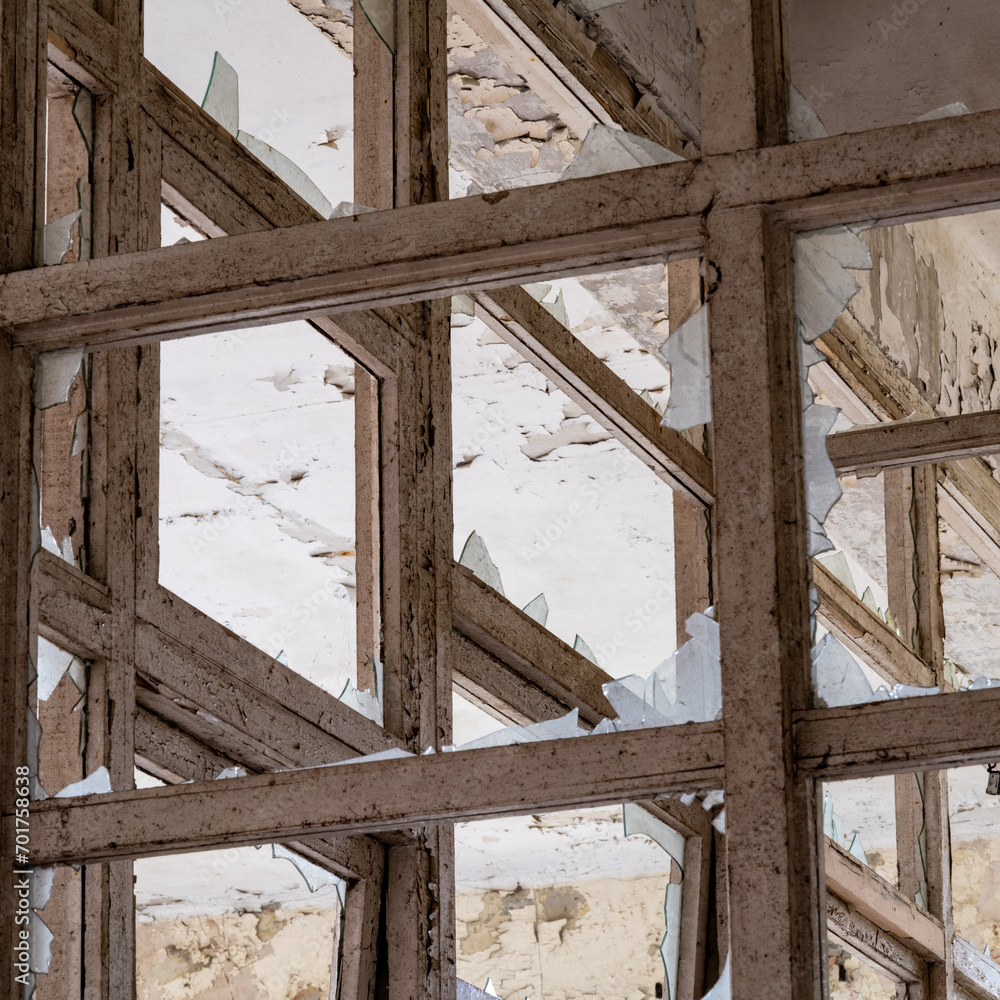 old wooden window frames in an abandoned stores building old wooden window frames in an abandoned stores building