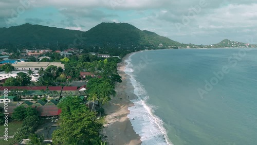 Beach, natural landscape, coastal seascape. Aerial view from drone, gorgeous sea washes shores of island. Great place to relax, reat, swim. Sandy beach, coast for tourists with incredible nature views photo