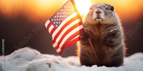 Groundhog day with a groundhog holding an USA flag poster with copy space. photo