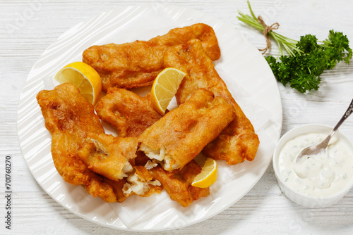 Photography deep fried crispy beer batter fish fillet on plate