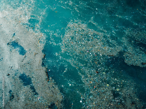 Indian ocean and plastic trash, aerial view. Pollution by rubbish in Indonesia