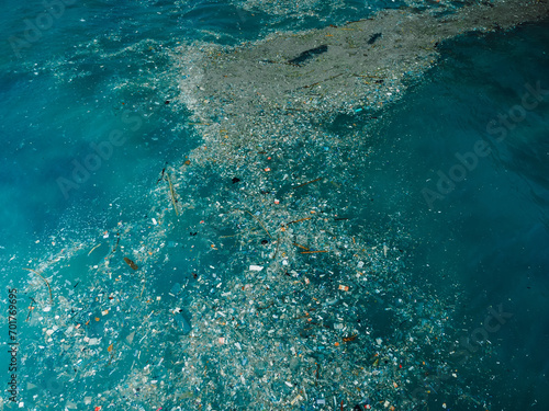 Indian ocean and plastic trash, drone view. Pollution by plastic rubbish in Bali