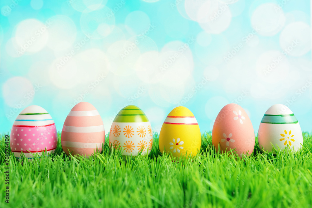 Colorful Easter eggs on green grass. Spring holidays concept. Colorful Easter eggs on green grass. Spring holidays concept.