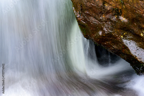 Detail of waterfall in a small stream photo