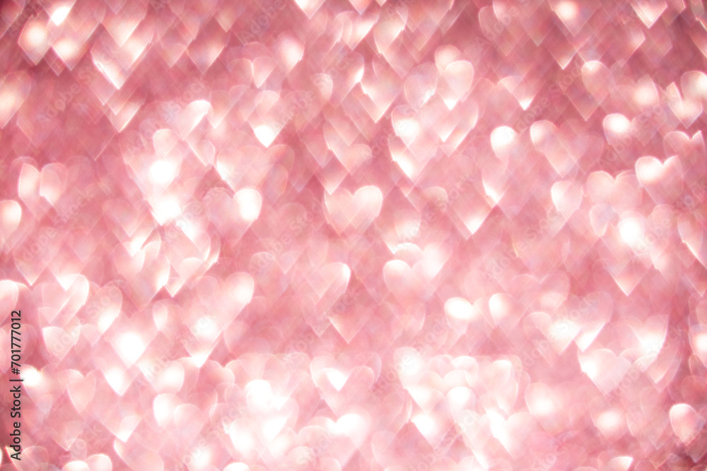Pink hearts, sparkling bokeh, abstract defocused background for Valentine's Day Pink hearts, sparkling bokeh, abstract defocused background for Valentine's Day