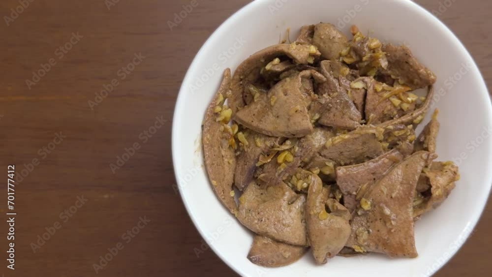 Fried pork liver with garlic. Fried pork liver with garlic.