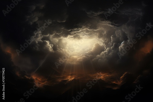 Paysage d'un ciel orageux mêlant obscurité et lumière à travers les nuages photo