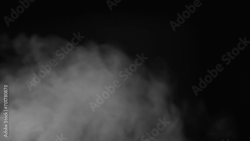 Hot water steam wet gas flow or steamy smoke with clouds video on black background. photo