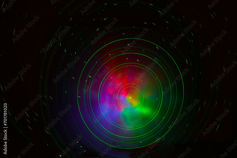 A nebula with star trails in the night sky A nebula with star trails in the night sky