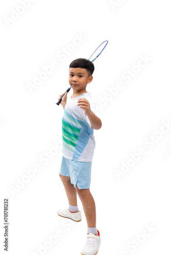 Badminton racket and badminton shuttlecock. Portrait Young Asian cute boy standing on white background banner. Sport man