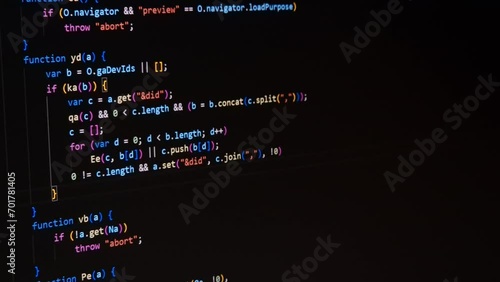 Code. Colorful jsx javascript computer programming code scroll close up pixel detail shot 4K super macro on screen.