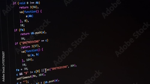 Code. Colorful jsx javascript computer programming code scroll close up pixel detail shot 4K super macro on screen.