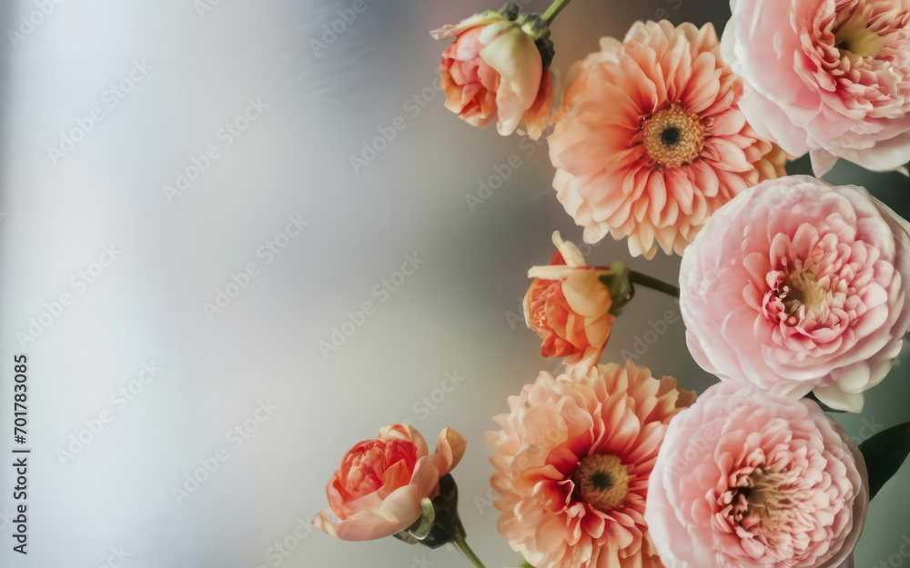 Top view of gorgeous flowers arrangement on a neutral background Top view of gorgeous flowers arrangement on a neutral background