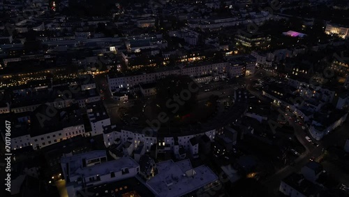 Aerial view of Cheltenham England town centre at night with houses and cars photo
