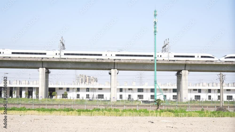 high speed train through elevated railtrack high speed train through elevated railtrack