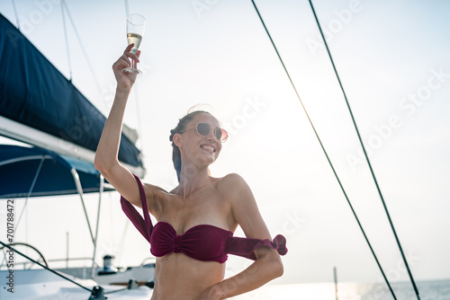 Young woman drink a champag...